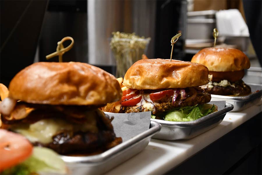 Plates of hamburgers from Brown Bag Burger