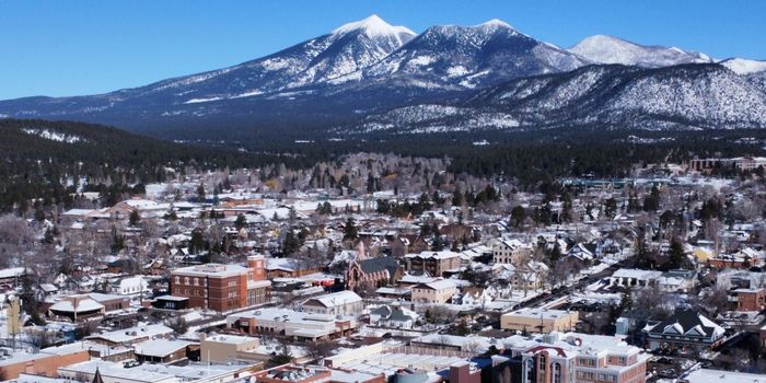Photo of flagstaff taken from above showing snow on the ground